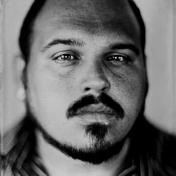 black and white closeup portrait of Jared Zimmerman